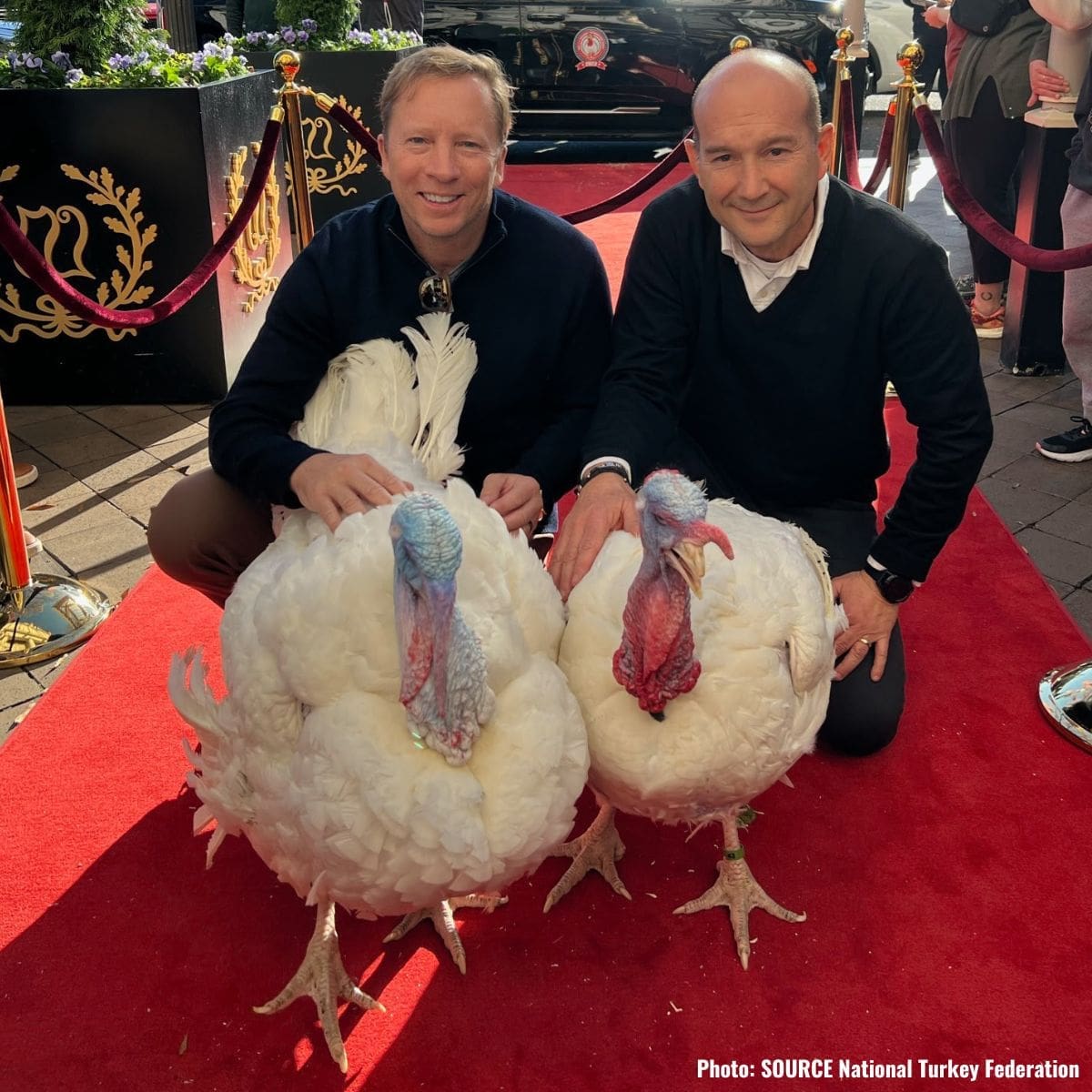 NTF Chairman Steve Lykken and Jose Rojas from Jennie-O Turkey Store with two turkey named Liberty and Bell at the red carpet.